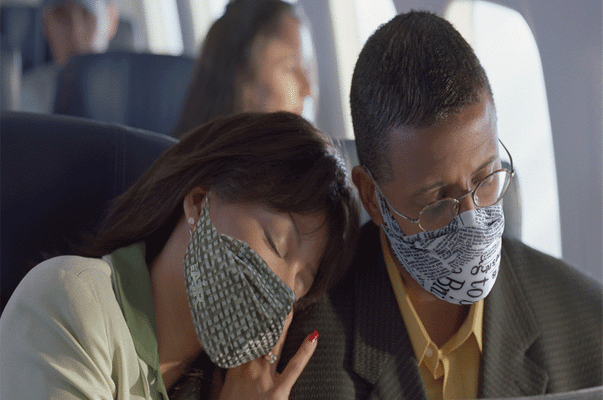 couples with mask in-flight