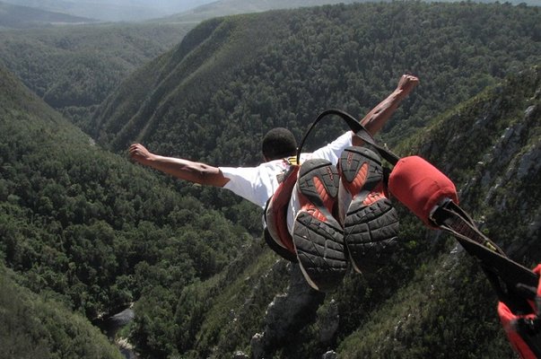 a man jumping off bloukran bridge