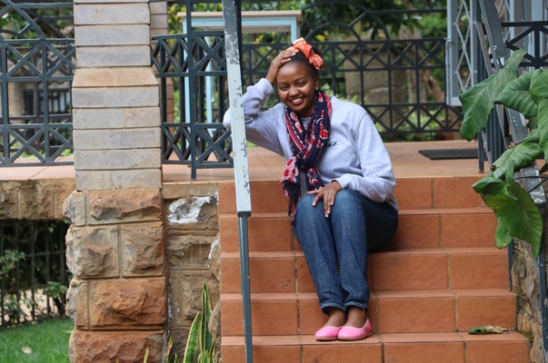 African lady on a stairs