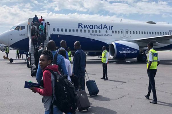 passengers boarding Rwandair flight